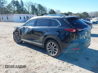 2018 Mazda CX-9 Grand Touring z VIN JM3TCADY5J0204845, wystawiony jako IAAI lot #41292695 z przebiegiem 98 751 mil mil oraz . Historia ofert i sprzedaży dostępna na DreamBid. Obrazek 3.