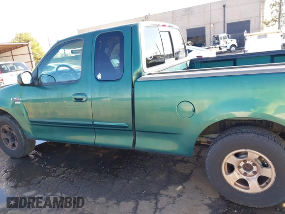 1999 Ford F-150 XL with VIN 1FTRX17L3XNC30010, listed as a IAAI auction lot 41632812 with 268,884 mi miles. Bid and sale history available at carsss.com. Image 14.