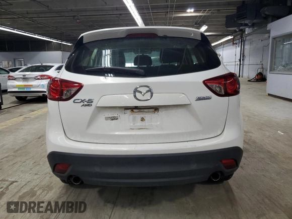 2016 Mazda CX-5 Sport with VIN JM3KE4BY9G0694709, listed as a Copart auction lot 55147555 with 98,900 mi miles and Salvage title. Bid and sale history available at DreamBid. Image 6.