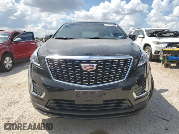 2024 Cadillac XT5 FWD Luxury with VIN 1GYKNAR42RZ731988, listed as a Copart auction lot 72777544 with 5,965 mi miles and Salvage title. Bid and sale history available at DreamBid. Image 5.