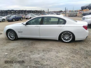 2015 BMW 7 Series 750Li with VIN WBAYE8C50FD781160, listed as a IAAI auction lot 41061232 with 154,496 mi miles. Bid and sale history available at carsss.com. Image 14.