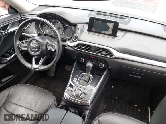 2016 Mazda CX-9 Sport with VIN JM3TCABY4G0100620, listed as a IAAI auction lot 42316216 with 191,245 mi miles and . Bid and sale history available at DreamBid. Image 5.