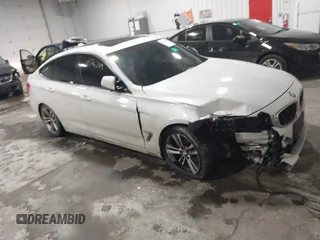 2016 BMW 3 Series 328i Gran Turismo xDrive z VIN WBA8Z5C53GG502741, wystawiony jako IAAI lot #41566289 z przebiegiem 32 189 mil mil oraz . Historia ofert i sprzedaży dostępna na DreamBid. Obrazek 1.