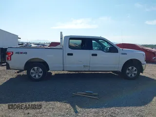 2018 Ford F-150 XL with VIN 1FTFW1E59JFC95665, listed as a IAAI auction lot 42512834 with 196,021 mi miles and . Bid and sale history available at DreamBid. Image 13.