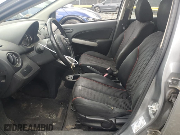 2013 Mazda 2 Touring z VIN JM1DE1LZ7D0153662, wystawiony jako Copart lot #58562435 z przebiegiem 109 329 mil mil oraz Szkoda całkowita • Salvage title. Historia ofert i sprzedaży dostępna na DreamBid. Obrazek 7.