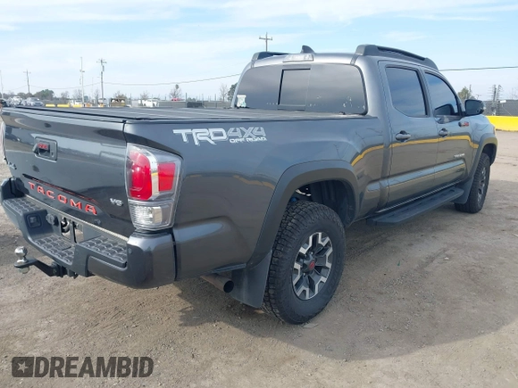 2021 Toyota Tacoma 4WD SR5 with VIN 3TMDZ5BN5MM110218, listed as a IAAI auction lot 41430303 with 47,781 mi miles. Bid and sale history available at carsss.com. Image 4.