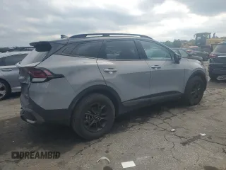 2023 Kia Sportage X-Pro z VIN 5XYK7CAFXPG094501, wystawiony jako Copart lot #56043535 z przebiegiem 19 241 mil mil oraz Szkoda całkowita • Salvage title. Historia ofert i sprzedaży dostępna na DreamBid. Obrazek 3.