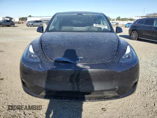 2024 Tesla Model Y with VIN 7SAYGDED4RF017614, listed as a Copart auction lot 88494625 with 11,209 mi miles and Salvage title. Bid and sale history available at DreamBid. Image 5.