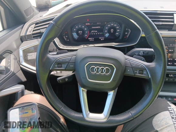 2023 Audi Q3 S line Premium with VIN WA1DECF34P1112062, listed as a IAAI auction lot 42806719 with 49,926 mi miles and . Bid and sale history available at DreamBid. Image 32.