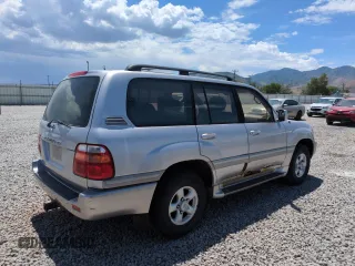 2000 Toyota Land Cruiser z VIN JT3HT05J5Y0118136, wystawiony jako Copart lot #60333115 z przebiegiem 184 284 mil mil oraz Czysty tytuł • Clean title. Historia ofert i sprzedaży dostępna na DreamBid. Obrazek 3.