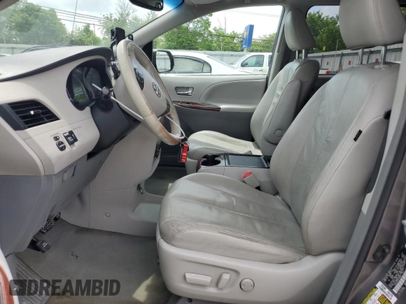 2012 Toyota Sienna XLE AAS with VIN 5TDYK3DC6CS189399, listed as a Copart auction lot 57188555 with Not provided miles and Clean title. Bid and sale history available at DreamBid. Image 7.