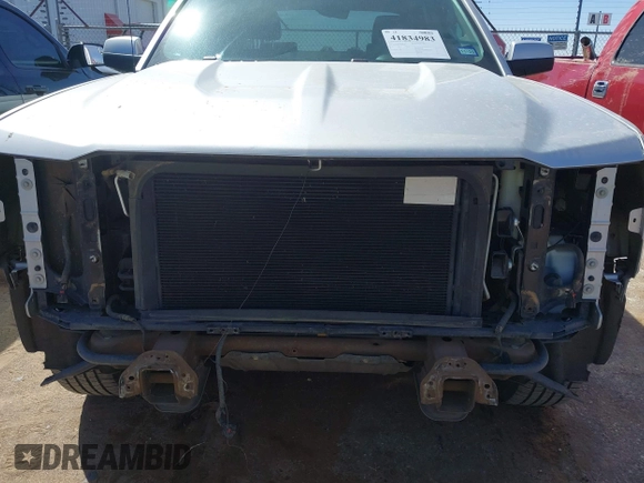 2018 Chevrolet Silverado 1500 LT with VIN 3GCPCREC5JG506529, listed as a IAAI auction lot 41834983 with 83,623 mi miles and . Bid and sale history available at DreamBid. Image 6.