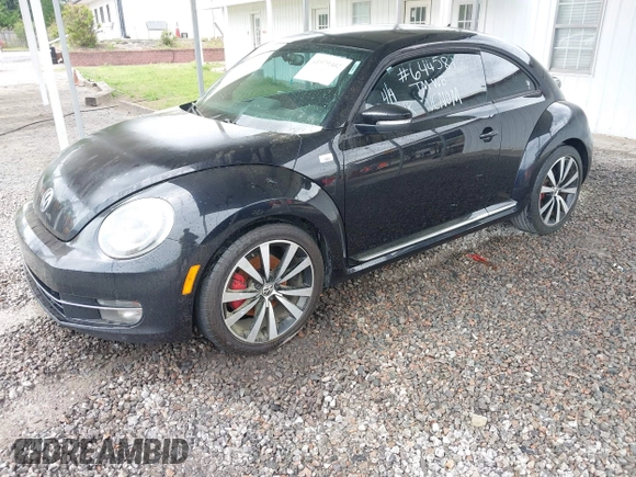 2012 Volkswagen Beetle with VIN 3VWV67AT3CM644581, listed as a IAAI auction lot 41979302 with 251,937 mi miles and . Bid and sale history available at DreamBid. Image 2.