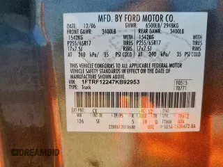 2007 Ford F-150 XL with VIN 1FTRF12247KB92953, listed as a Copart auction lot 61055325 with 79,947 mi miles and Salvage title. Bid and sale history available at DreamBid. Image 12.