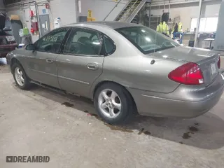 2001 Ford Taurus SES with VIN 1FAFP55U01G211079, listed as a IAAI auction lot 40895191 with 151,912 mi miles. Bid and sale history available at carsss.com. Image 3.