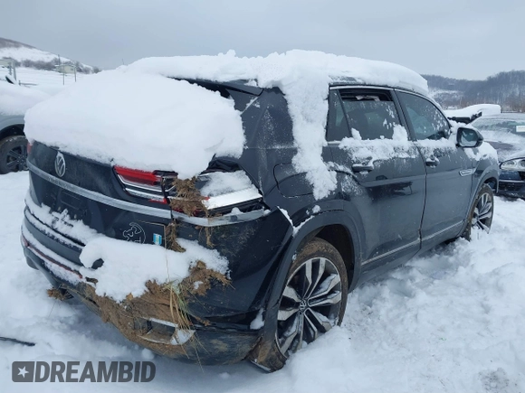 2022 Volkswagen Atlas SEL Premium R-Line with VIN 1V2FE2CA4NC221469, listed as a IAAI auction lot 41236003 with 57,017 mi miles and . Bid and sale history available at DreamBid. Image 4.