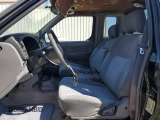1999 Nissan Frontier XE with VIN 1N6DD26S6XC327079, listed as a Copart auction lot 49295335 with 170,753 mi miles and Salvage title. Bid and sale history available at DreamBid. Image 7.