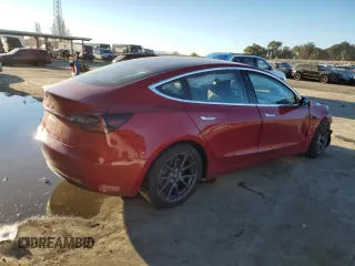 2018 Tesla Model 3 Long Range Battery with VIN 5YJ3E1EAXJF047285, listed as a Copart auction lot 87875175 with 114,896 mi miles and Salvage Title. Bid and sale history available at DreamBid. Image 3.