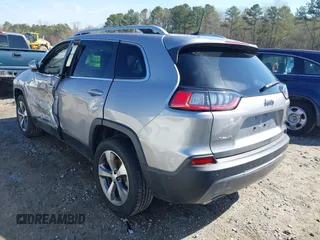 2021 Jeep Cherokee Limited with VIN 1C4PJMDX5MD119056, listed as a IAAI auction lot 41828573 with 56,507 mi miles. Bid and sale history available at carsss.com. Image 3.