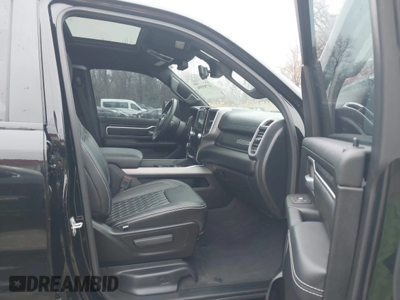 2022 Ram 1500 Big Horn with VIN 1C6SRFFT3NN287385, listed as a IAAI auction lot 41793596 with 12,277 mi miles and . Bid and sale history available at DreamBid. Image 5.