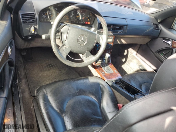 1997 Mercedes-Benz SL-Class with VIN WDBFA63F7VF145758, listed as a Copart auction lot 77503244 with 132,664 mi miles and Clean Title. Bid and sale history available at carsss.com. Image 8.