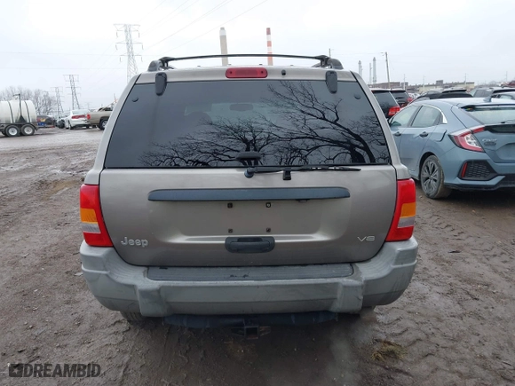 1999 Jeep Grand Cherokee Laredo with VIN 1J4GW58N0XC748809, listed as a IAAI auction lot 41722910 with 201,407 mi miles. Bid and sale history available at carsss.com. Image 16.