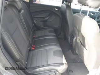 2013 Ford Escape Titanium with VIN 1FMCU0J96DUC31879, listed as a IAAI auction lot 42637019 with 66,096 mi miles and . Bid and sale history available at DreamBid. Image 8.