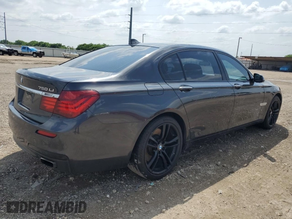 2015 BMW 7 Series 750Li z VIN WBAYE8C51FD782155, wystawiony jako Copart lot #54796505 z przebiegiem 112 772 mil mil oraz Szkoda całkowita • Salvage title. Historia ofert i sprzedaży dostępna na DreamBid. Obrazek 3.