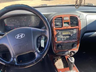2004 Hyundai Sonata GLS with VIN KMHWF35H74A973171, listed as a Copart auction lot 77613394 with 151,973 mi miles and Clean Title. Bid and sale history available at carsss.com. Image 9.