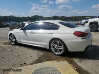 2016 BMW 6 Series 640i with VIN WBA6D0C55GD927744, listed as a Copart auction lot 74303434 with 0 mi miles and Clean Title. Bid and sale history available at carsss.com. Image 2.