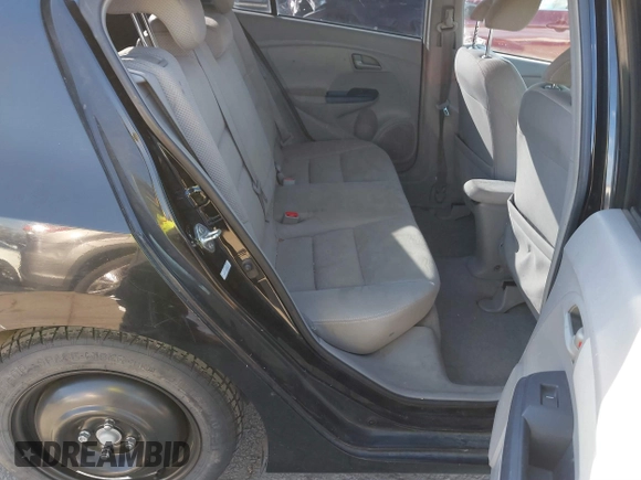 2010 Honda Insight EX with VIN JHMZE2H74AS012517, listed as a IAAI auction lot 41886588 with 227,428 mi miles and . Bid and sale history available at DreamBid. Image 8.