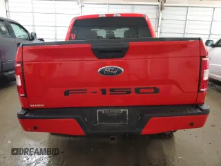 2020 Ford F-150 XL with VIN 1FTEW1E50LKF31657, listed as a Copart auction lot 83083394 with 56,669 mi miles and Salvage title. Bid and sale history available at DreamBid. Image 6.