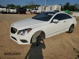 2015 Mercedes-Benz E 400 with VIN WDDKJ6HB2FF298934, listed as a Copart auction lot 74884344 with 157,841 mi miles and Salvage title. Bid and sale history available at DreamBid. Image 1.