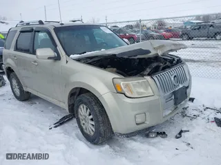 2010 Mercury Mariner Premier with VIN 4M2CN8H72AKJ05699, listed as a IAAI auction lot 41631468 with 205,563 mi miles. Bid and sale history available at carsss.com. Image 1.