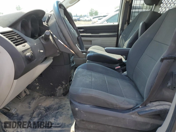 2009 Dodge Grand Caravan with VIN 1D8HN11E99B505784, listed as a Copart auction lot 60590065 with 195,488 mi miles and Salvage title. Bid and sale history available at DreamBid. Image 7.