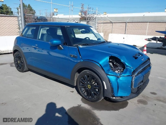 2024 MINI Hardtop 2 Door Cooper SE with VIN WMW13DJ01R2V90046, listed as a IAAI auction lot 41448064 with 3,963 mi miles. Bid and sale history available at carsss.com. Image 1.