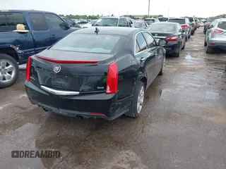 2014 Cadillac ATS Luxury AWD z VIN 1G6AH5R30E0150854, wystawiony jako IAAI lot #42422421 z przebiegiem 96 713 mil mil oraz . Historia ofert i sprzedaży dostępna na DreamBid. Obrazek 4.