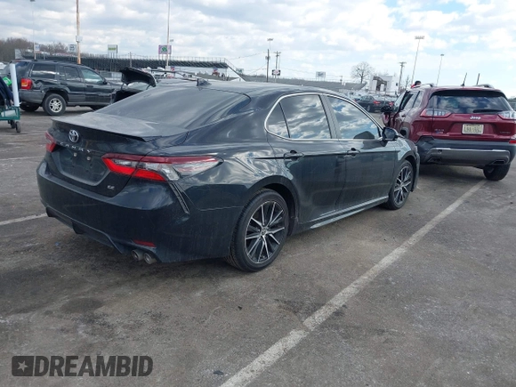2021 Toyota Camry SE Nightshade with VIN 4T1G11AK6MU488155, listed as a IAAI auction lot 41394539 with 53,577 mi miles. Bid and sale history available at carsss.com. Image 4.