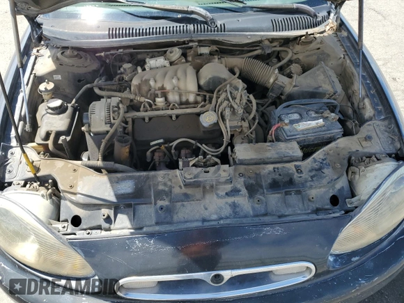 1997 Mercury Sable GS z VIN 1MELM50U1VA620597, wystawiony jako Copart lot #51635765 z przebiegiem 250 824 mil mil oraz Szkoda całkowita • Salvage title. Historia ofert i sprzedaży dostępna na DreamBid. Obrazek 11.