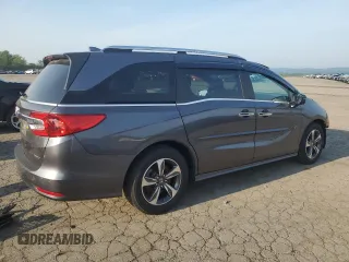 2018 Honda Odyssey Touring с VIN 5FNRL6H83JB009998, выставлен на аукционе Copart как лот 60616695 с пробегом 101 880 миль миль и Списание • Salvage title. История ставок и продаж доступна на DreamBid. Изображение 3.