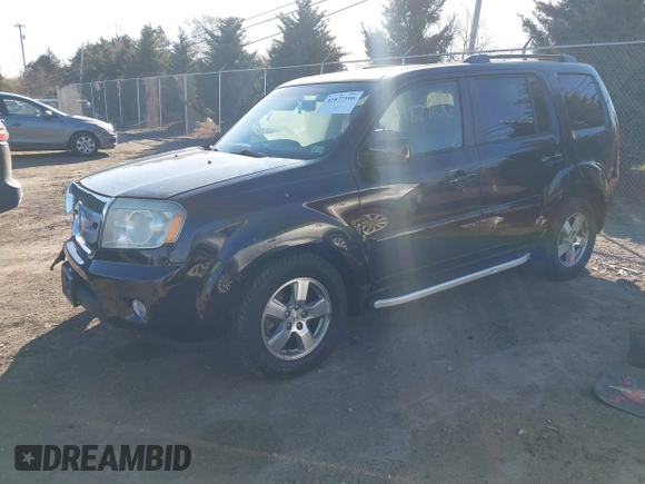 2011 Honda Pilot EX-L with VIN 5FNYF4H51BB023347, listed as a IAAI auction lot 41877106 with 167,039 mi miles. Bid and sale history available at carsss.com. Image 2.