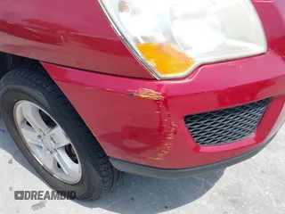 2009 Kia Sportage LX with VIN KNDJE723897599966, listed as a IAAI auction lot 42107627 with 118,512 mi miles. Bid and sale history available at carsss.com. Image 6.