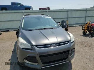 2015 Ford Escape Titanium z VIN 1FMCU9J97FUA38731, wystawiony jako Copart lot #60621085 z przebiegiem 119 704 mil mil oraz Szkoda całkowita • Salvage title. Historia ofert i sprzedaży dostępna na DreamBid. Obrazek 14.