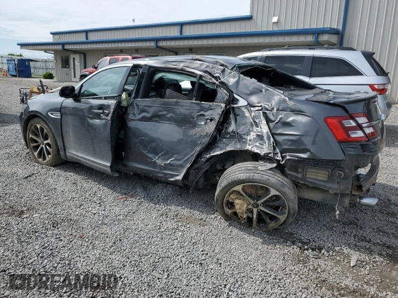 2015 Ford Taurus SEL z VIN 1FAHP2E89FG177287, wystawiony jako Copart lot #56074615 z przebiegiem 196 421 mil mil oraz Szkoda całkowita • Salvage title. Historia ofert i sprzedaży dostępna na DreamBid. Obrazek 2.