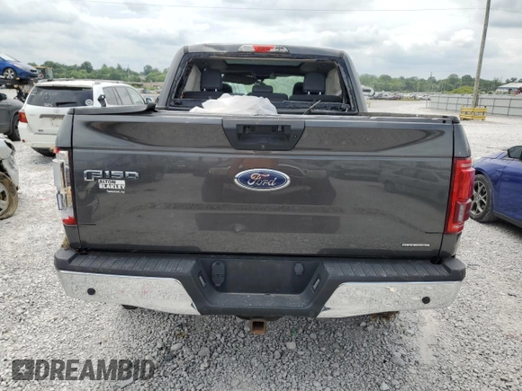2015 Ford F-150 XLT with VIN 1FTEW1EFXFFC60791, listed as a Copart auction lot 58831015 with Not provided miles and Salvage title. Bid and sale history available at DreamBid. Image 6.