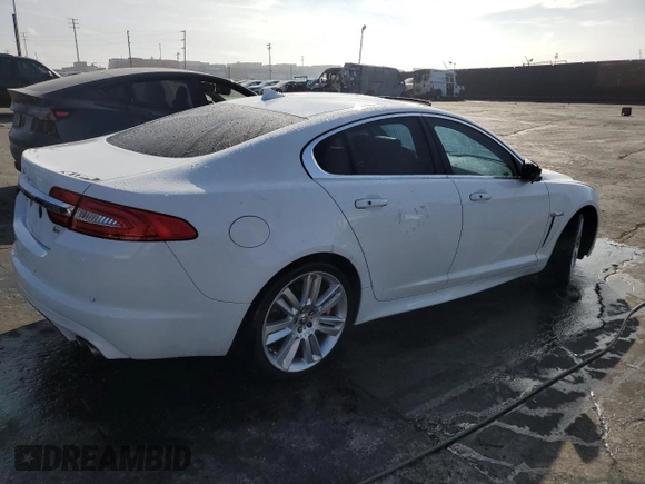 2013 Jaguar XF with VIN SAJWA8JC7DMS77243, listed as a Copart auction lot 77583544 with Not Provided miles and Salvage Title. Bid and sale history available at DreamBid. Image 3.