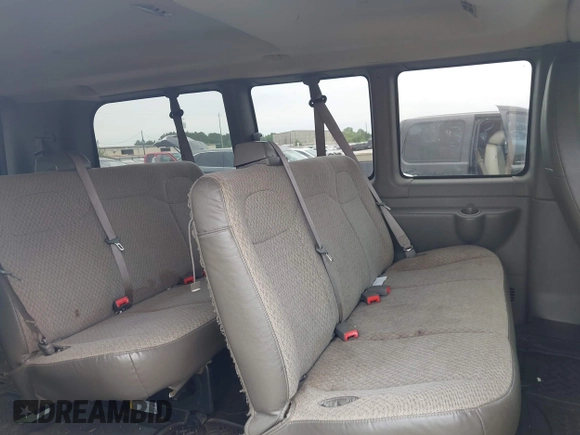 2013 Chevrolet Express Passenger 1LT with VIN 1GAZGYFG0D1117737, listed as a IAAI auction lot 42320524 with 103,968 mi miles and . Bid and sale history available at DreamBid. Image 8.