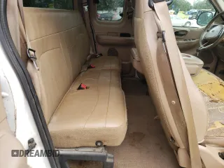 1999 Ford F-150 z VIN 1FTRX07W6XKA48100, wystawiony jako Copart lot #73209844 z przebiegiem Nie podano mil oraz Szkoda całkowita • Salvage title. Historia ofert i sprzedaży dostępna na DreamBid. Obrazek 10.