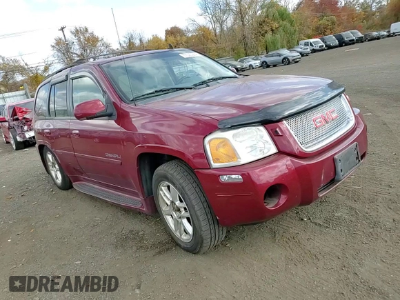 2007 GMC Envoy Denali with VIN 1GKET63M472231291, listed as a Copart auction lot 77020984 with 157,364 mi miles and Salvage Title. Bid and sale history available at DreamBid. Image 12.
