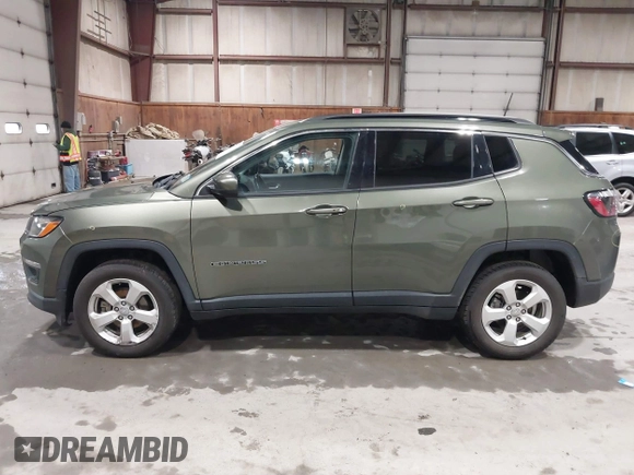 2021 Jeep Compass Latitude with VIN 3C4NJDBB1MT566220, listed as a IAAI auction lot 41816107 with 69,139 mi miles and . Bid and sale history available at DreamBid. Image 14.